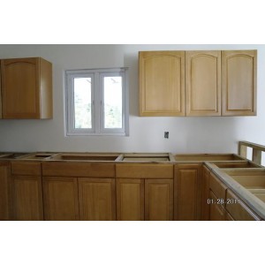 Raised panel maple kitchen cabinet