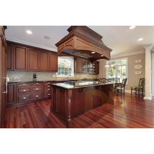 Raised Panel Kitchen Cabinetry with large Kitchen Island